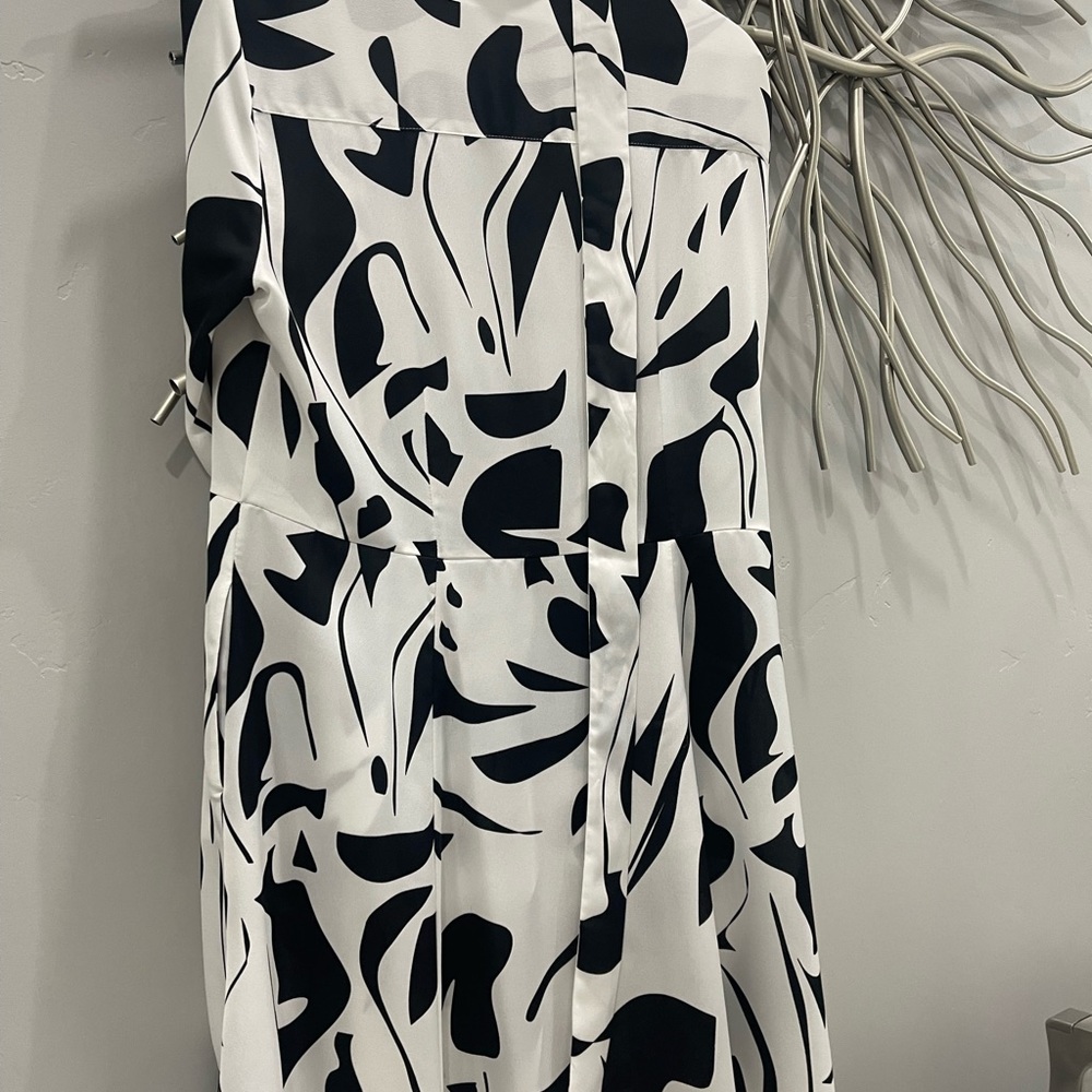 White and black belted satin dress